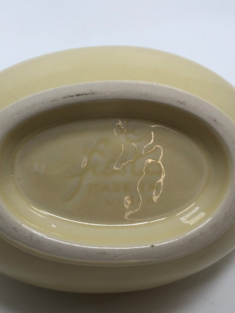 FIESTAWARE CREAM COLORED GRAVY BOAT.