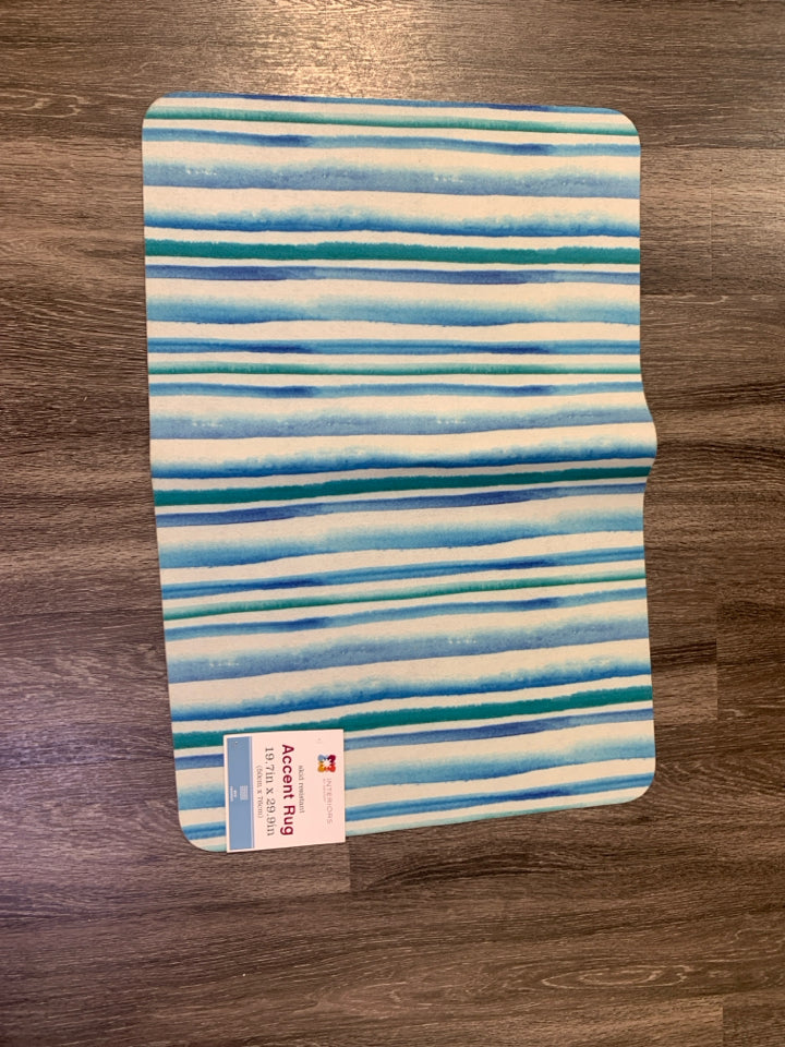 BLUE/GREEN STRIPPED SKID RESISTANT ACCENT RUG.