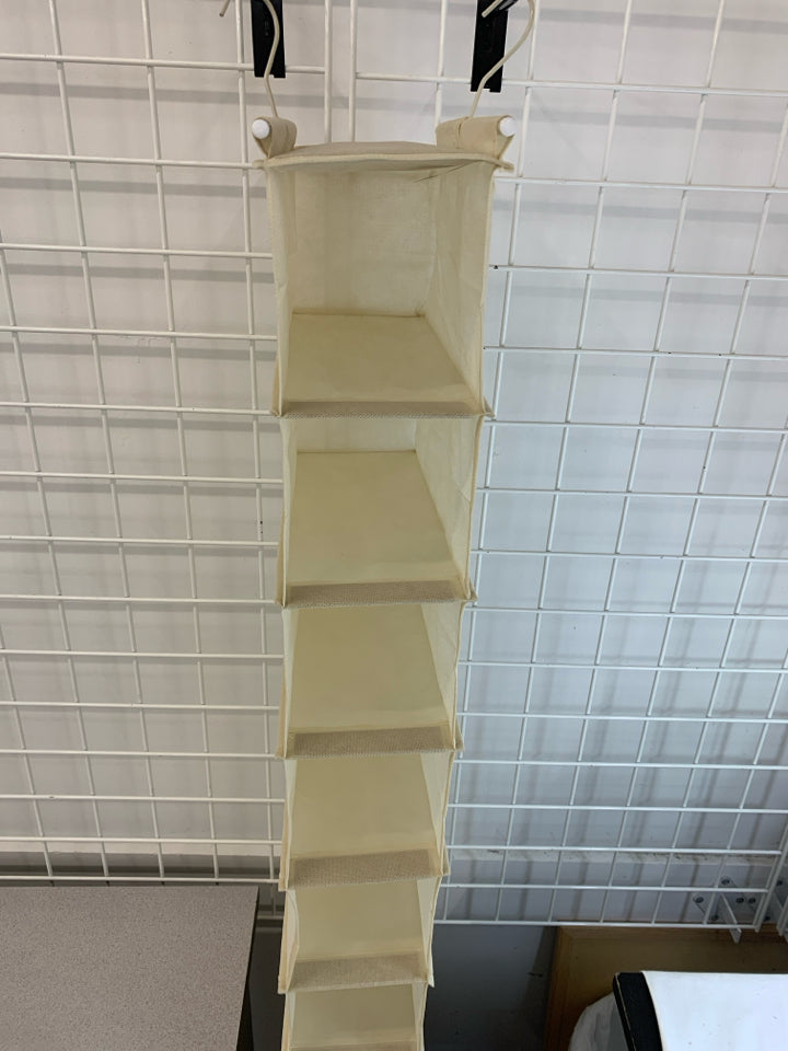 10-SLOT HANGING SHOE ORGANIZER.