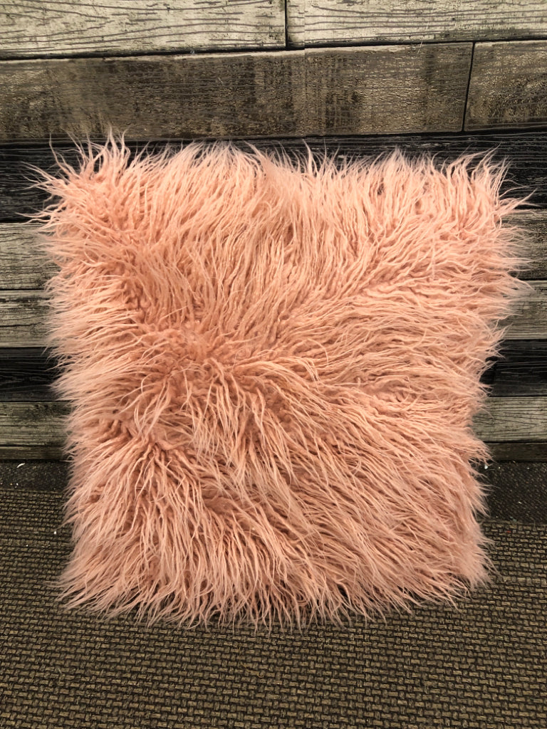 PINK SHAG PILLOW.