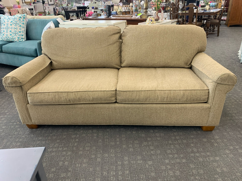 TAN LOVE SEAT.