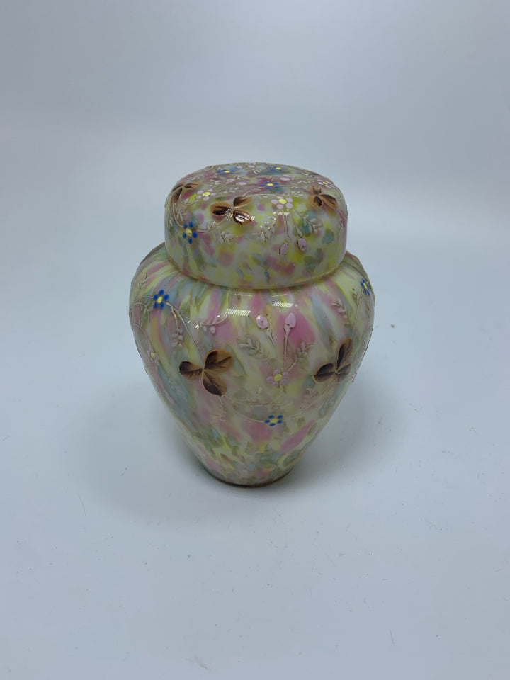 MULTI COLORED SMALL GLASS GINGER JAR W/ PAINTED CLOVERS.