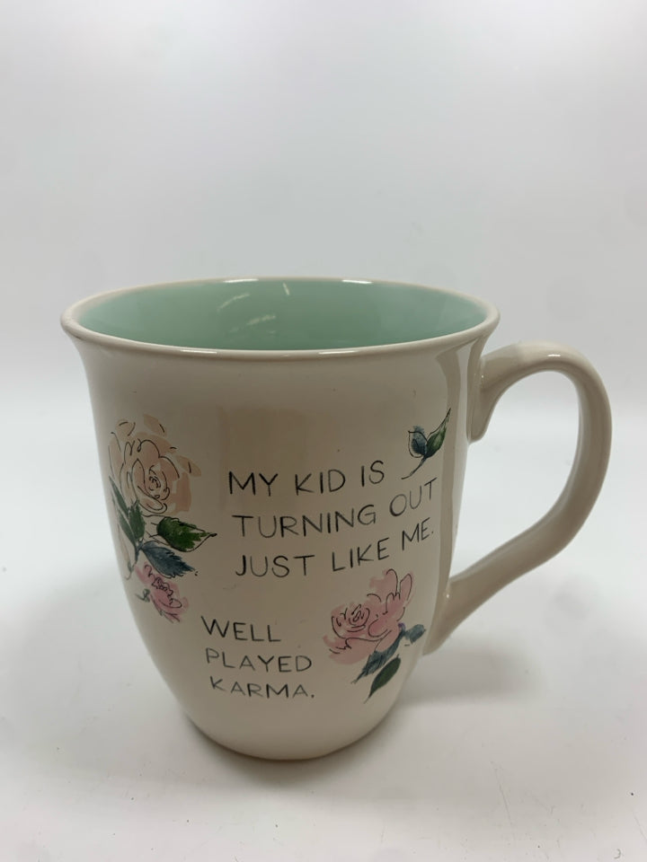 'MY KID IS TURNING OUT' MUG.