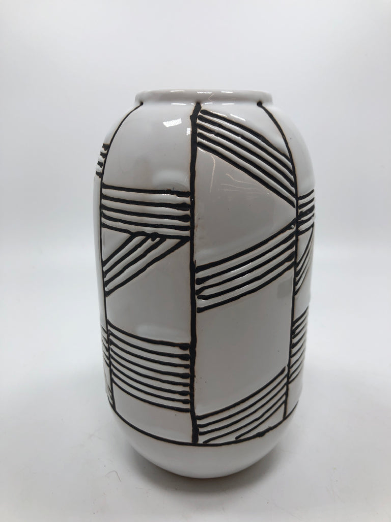 WHITE GLAZED VASE W/BLACK LINES.