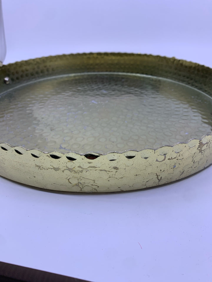 GOLD ROUND HAMMERED METAL TRAY W HANDLES.