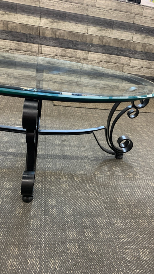 GLASS TOP METAL SCROLL COFFEE TABLE.