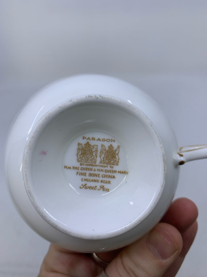 BLUE,PINK FLOWERS W/ BLACK EDGE.