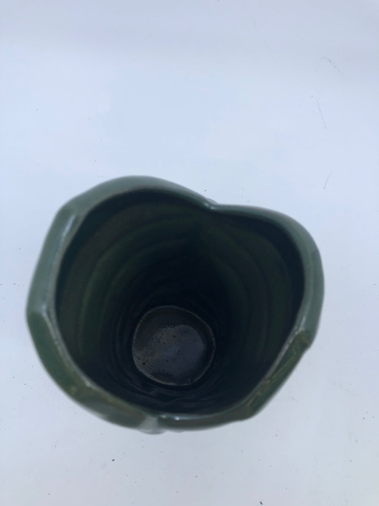 GREEN RIBBED CERAMIC VASE.