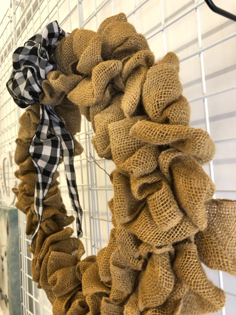 BURLAP WREATH W/BLACK WHITE BOW.