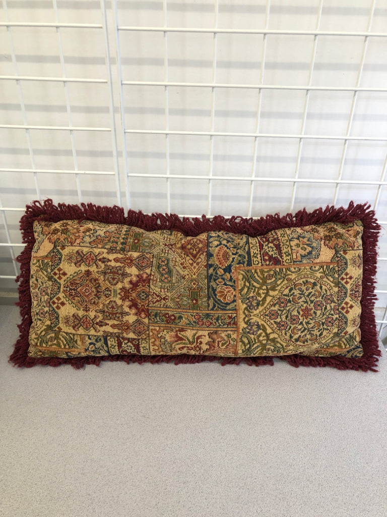 TAPESTRY RECTANGLE ACCENT PILLOW W/RED FRINGE.