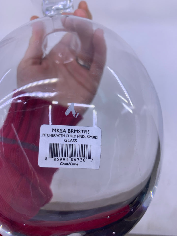 CLEAR GLASS SLANTED DECANTER W/ FOOTED STAND.