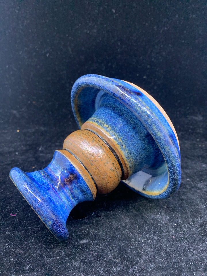 BLUE POTTERY TAPER CANDLE HOLDER.