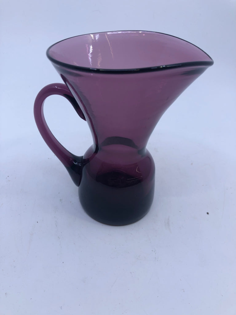 SMALL PURPLE GLASS WIDE TOP PITCHER.