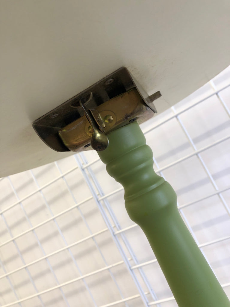 GREEN/CREAM PAINTED FLIP TOP PLANT STAND.