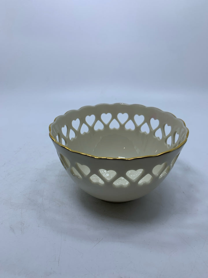 PORCELAIN PIERCED HEART CUTOUTS W/ EMBOSSED ROSES INSIDE CANDY DISH.