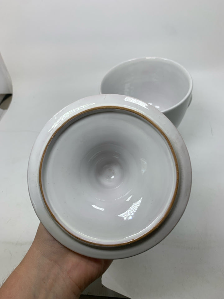 FOOTED URN SHAPED CANISTER W/ POINTED TOP.