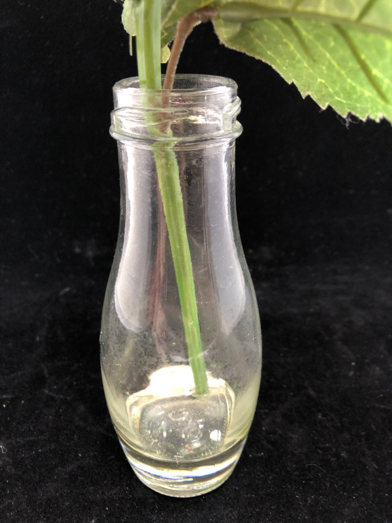 FAUX WHITE HYDRANGEA IN CLEAR GLASS BOTTLE.