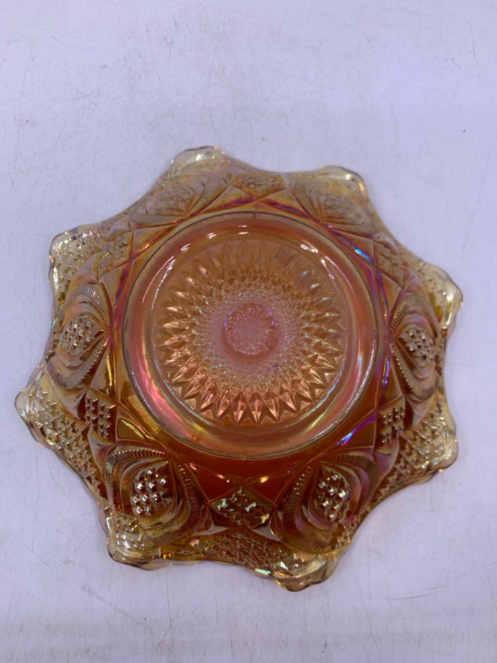 ORANGE CARNIVAL GLASS CUT GLASS BOWL W/ FLARED EDGES.