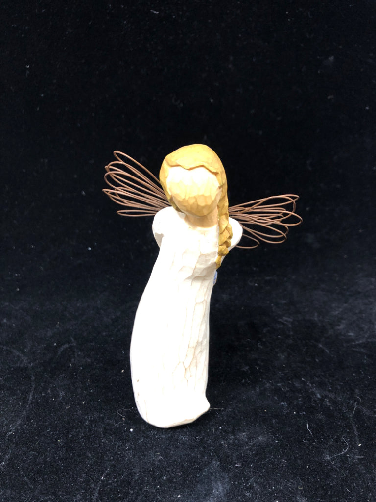 GIRL HOLDING BLUE FLOWERS BEHIND BACK THANK YOU.