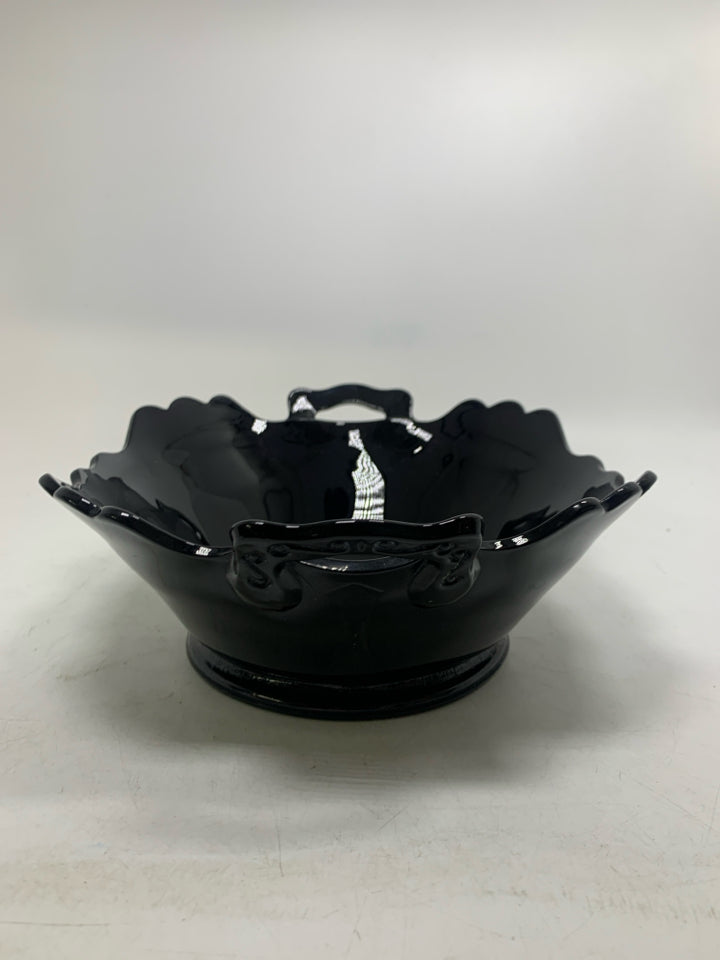 VTG FOOTED BLACK GLASS BOWL W/ HANDLES.