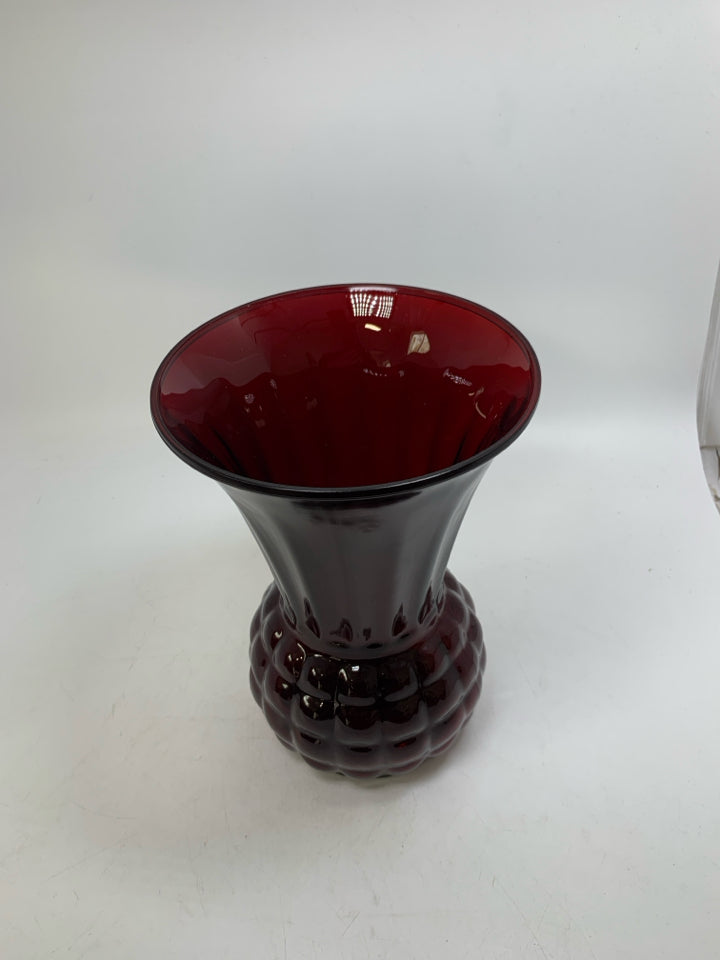RUBY RED GLASS TEXTURED BOTTOM VASE FLARED TOP.