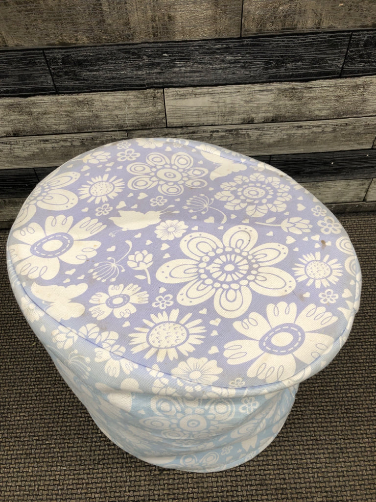 BLUE FLORAL CLOTH HAMPER.