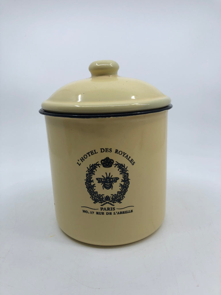 YELLOW METAL DECORATIVE CANISTER.