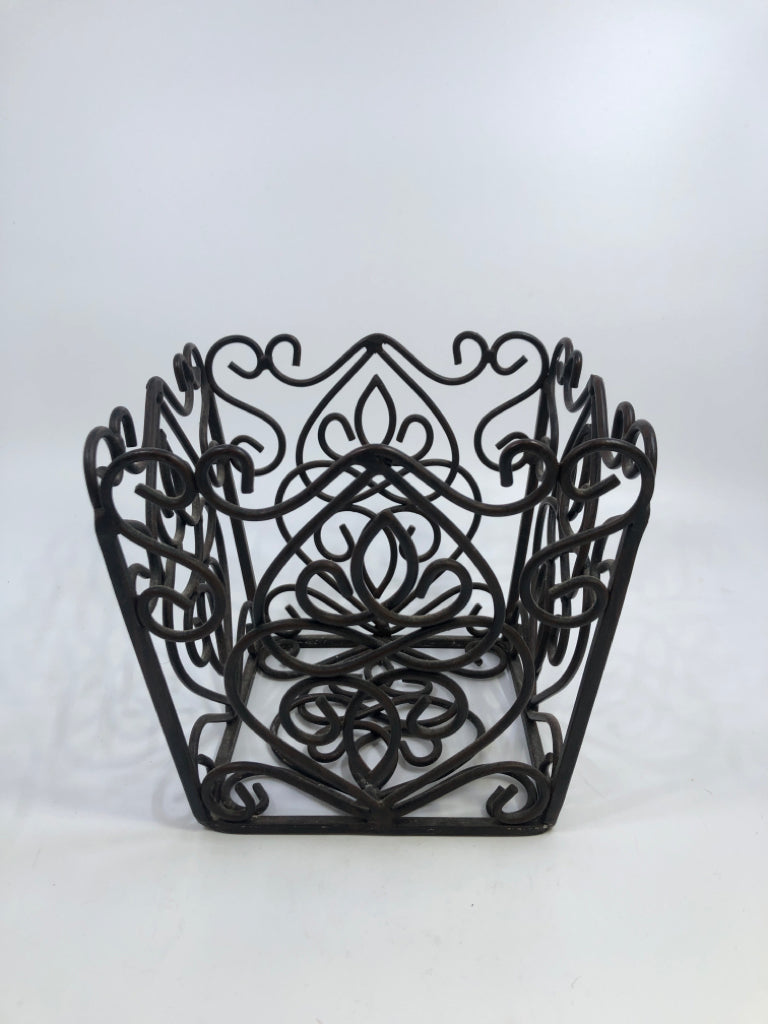 BROWN METAL SCROLL DETAIL BASKET.