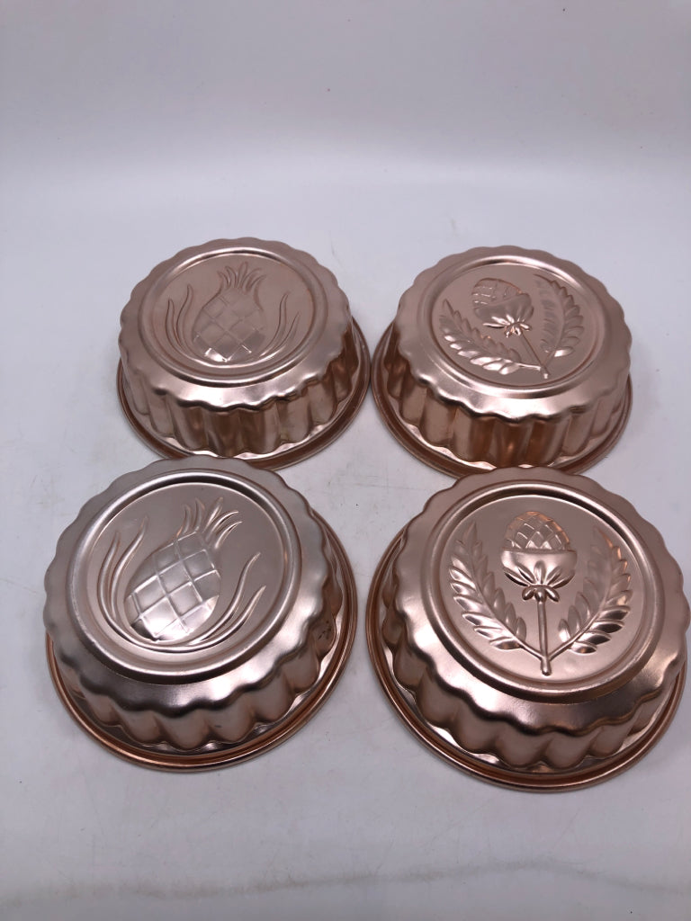 4 COPPER-COLORED GELATIN MOLDS.