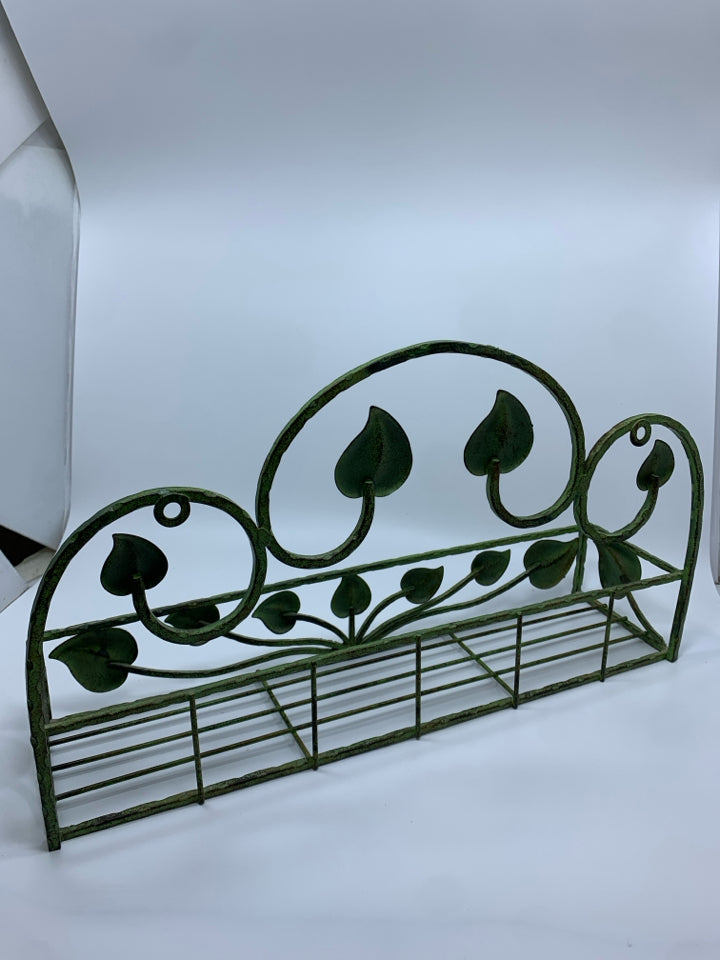 GREEN METAL LEAF SCROLL BASKET.
