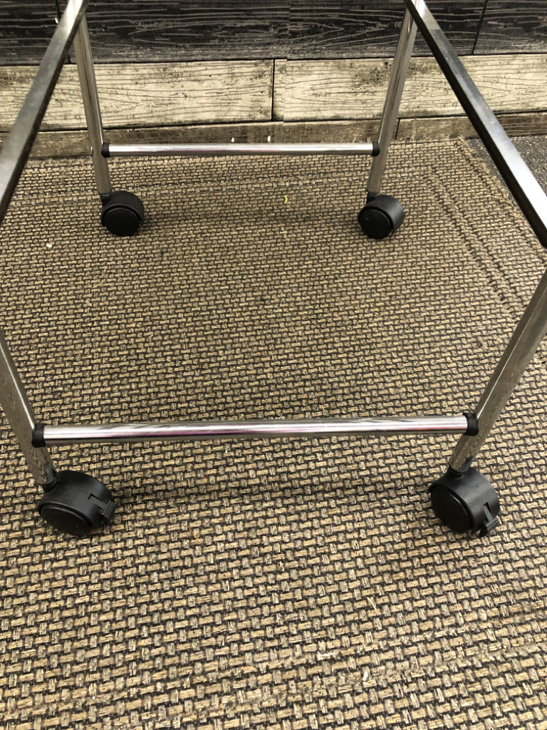 3 TIER BLACK PLASTIC/SILVER METAL STORAGE ROLLING CART.