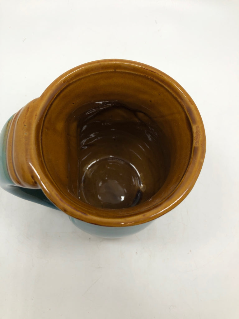 TEAL GLAZED COFFE MUG W/TURTLE.