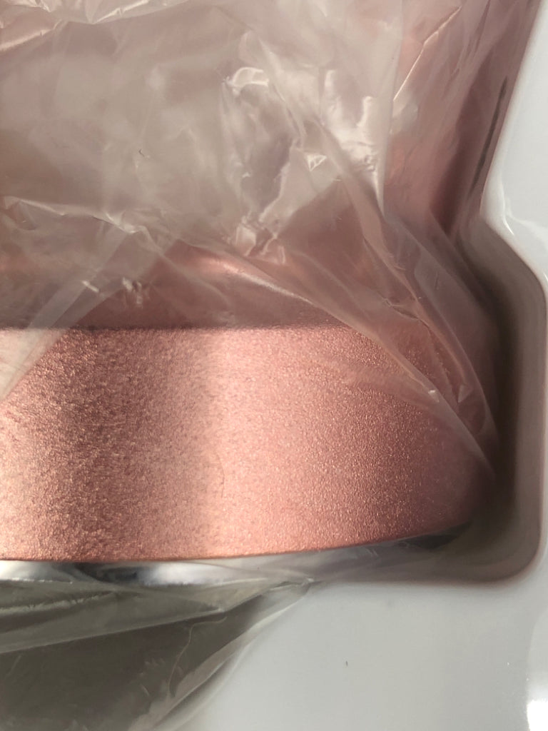 NIB PINK FOLDING HAIR DRYER.