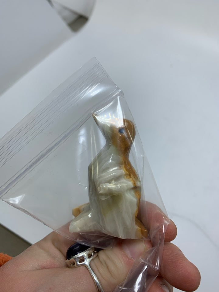 STONE CARVED PENGUIN/BIRD IN BAG.