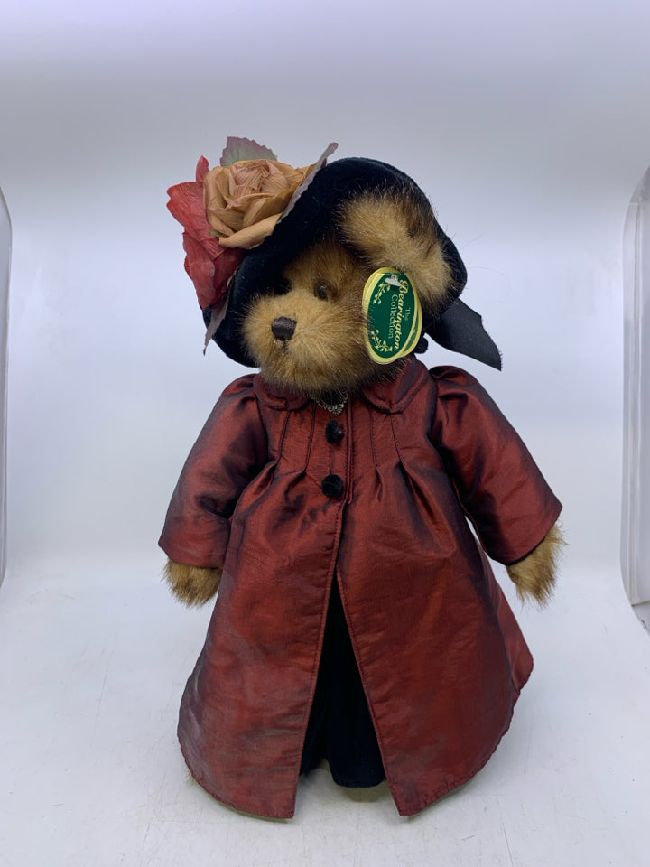 BEAR IN MAROON JACKET, BLACK HAT.