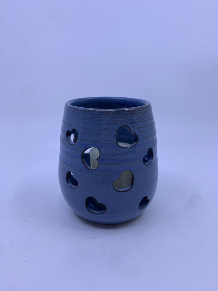PALE BLUE POTTERY HEART CUT OUT TEA LIGHT HOLDER.