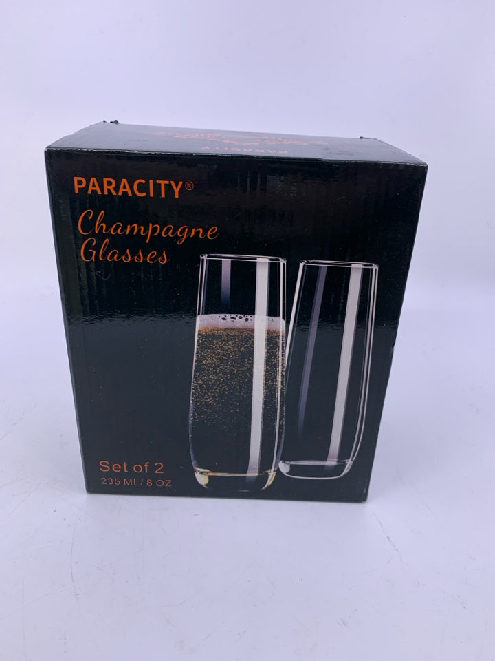 NIB 2 STEMLESS CHAMPAGNE GLASSES.