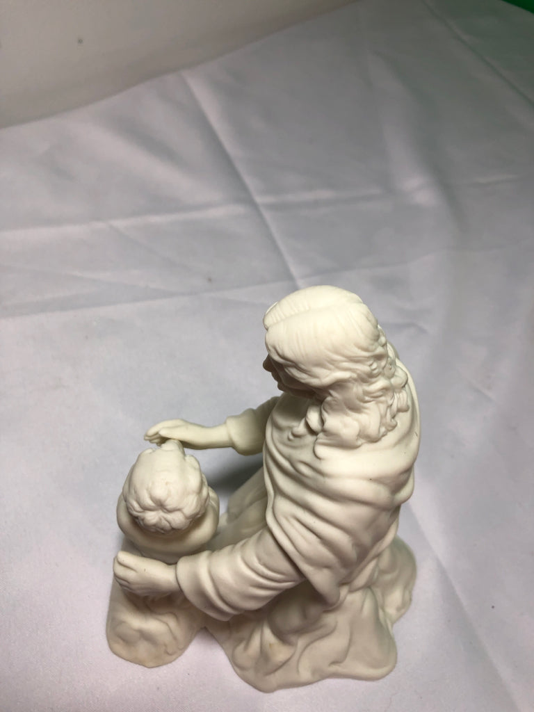 CREAM CERAMIC MAN AND CHILD.