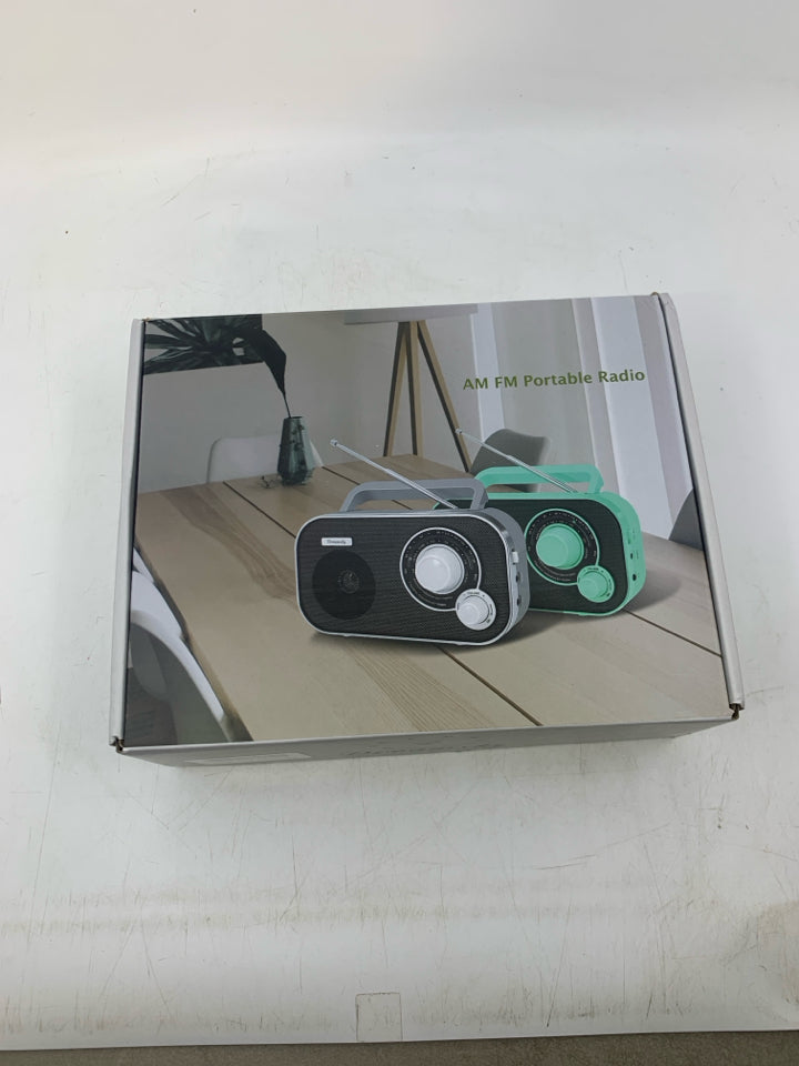 AM/FM RADIO- IN BOX