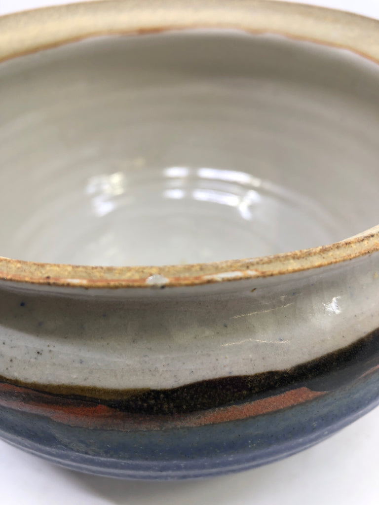 ROUND BLUE AND RED POTTERY CANISTER.