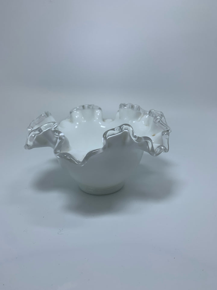 FOOTED MILK GLASS CANDY DISH W/ RUFFLED EDGE.