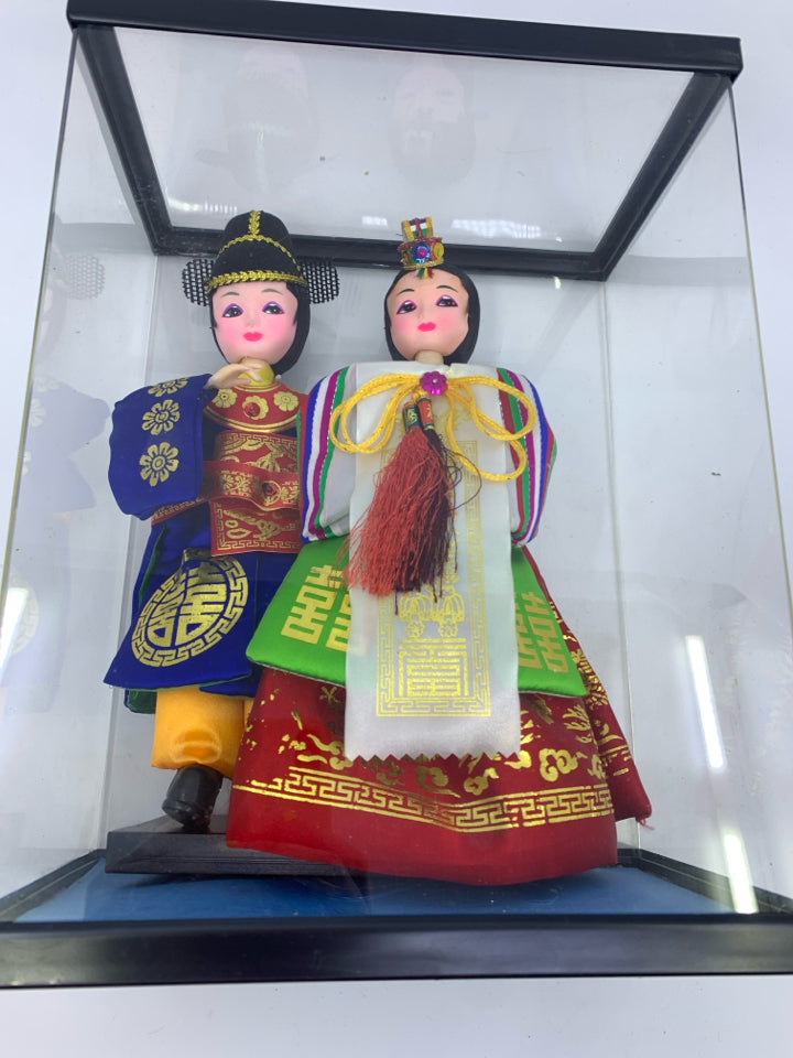2 ASIAN STYLE DOLLS IN CASE.