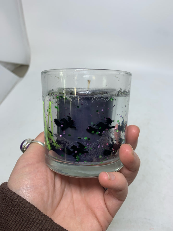 SMALL WITCH THEMED CANDLE.