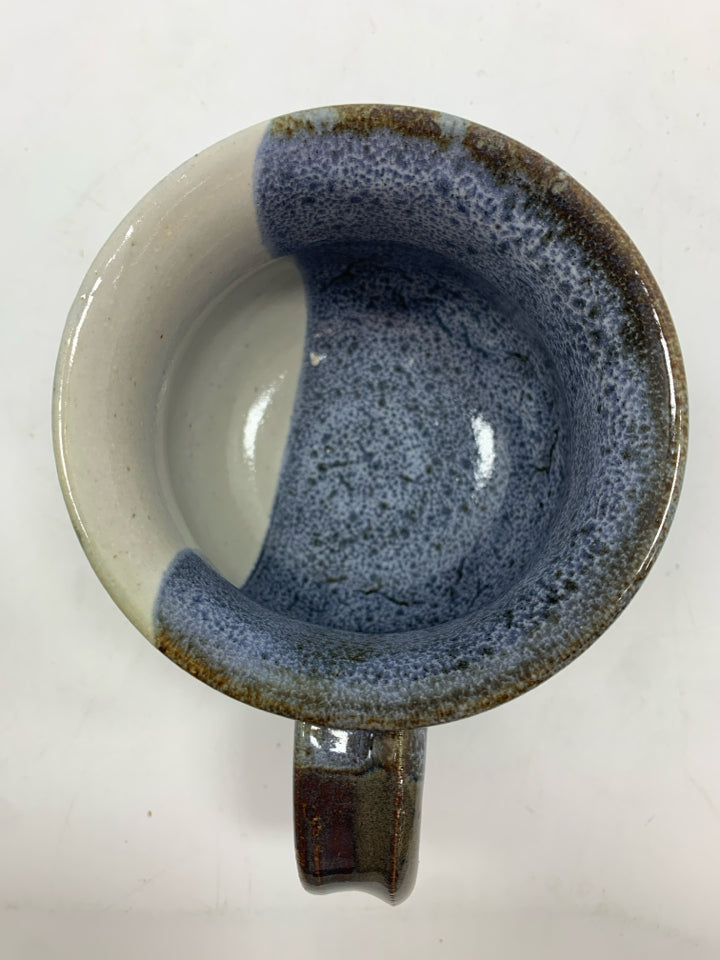 BLUE/WHITE GLAZED POTTERY MUG.