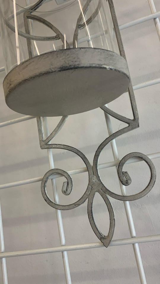 2 DISTRESSED METAL WALL SCONCE WITH GLASS GLOBES.