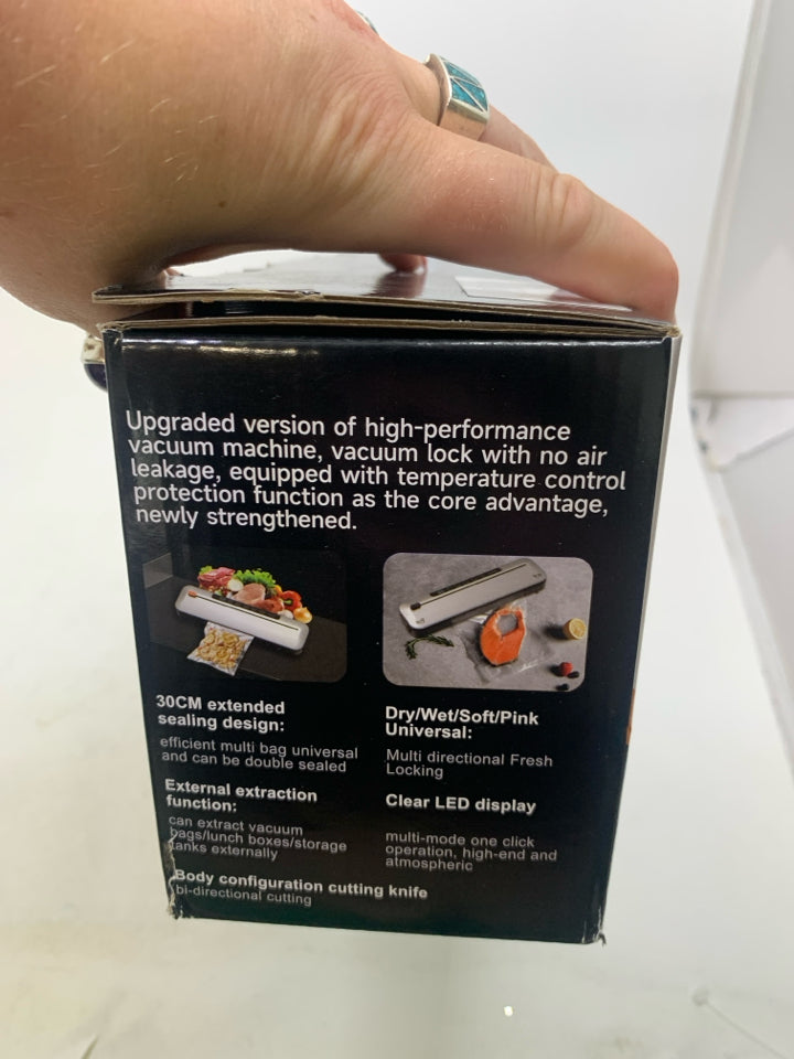 NIB VACUUM SEALER MACHINE.