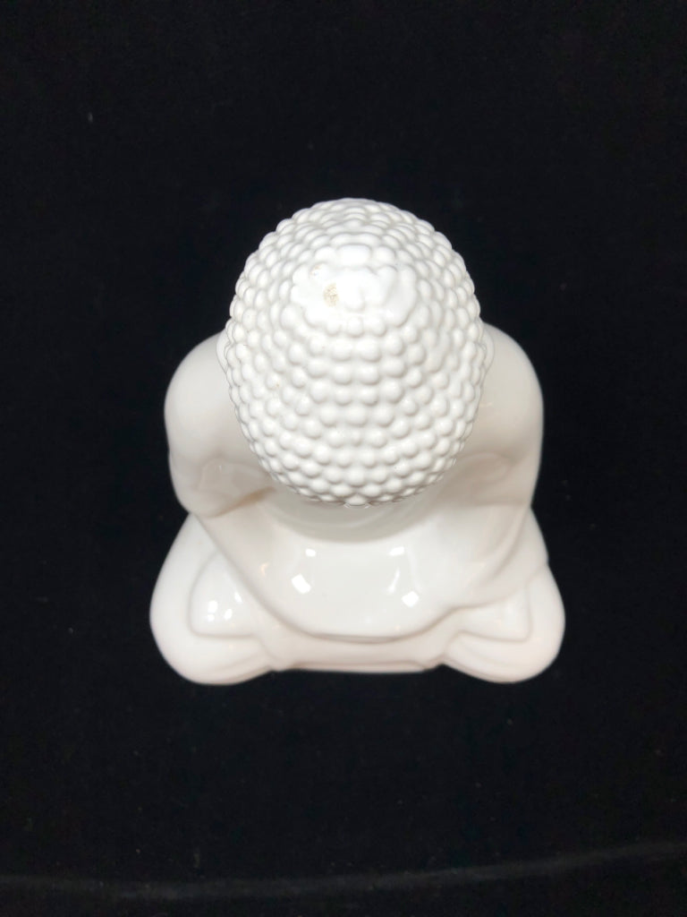WHITE CERAMIC BUDDHA SCULPTURE.