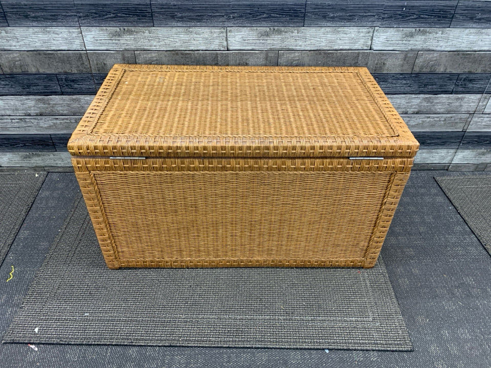 WICKER STORAGE CHEST W/METAL HANDLES.