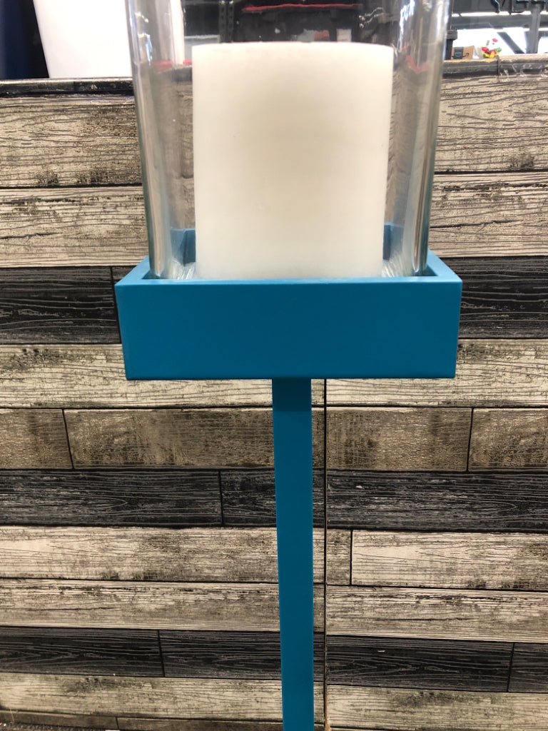 MEDIUM BLUE SQUARE BASE CANDLE HOLDER W/CLEAR GLASS TOP.