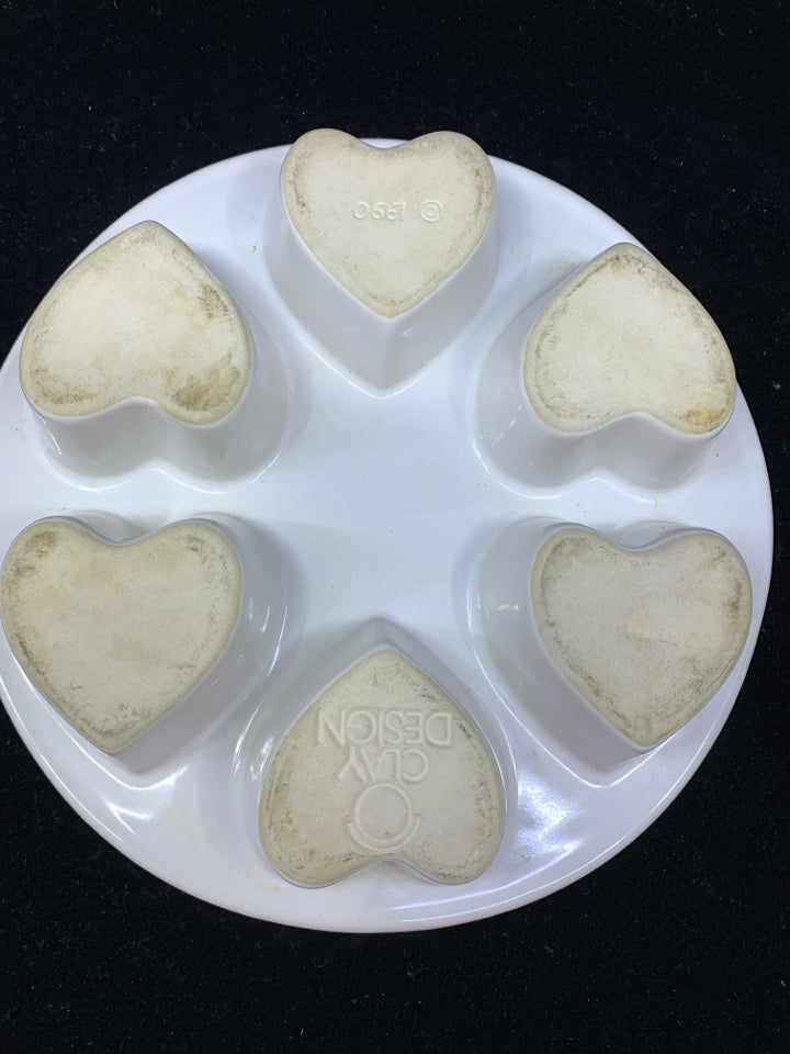 WHITE ORANGE/GREEN PUMPKIN HEART MUFFIN PAN.